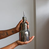 Oil pourer