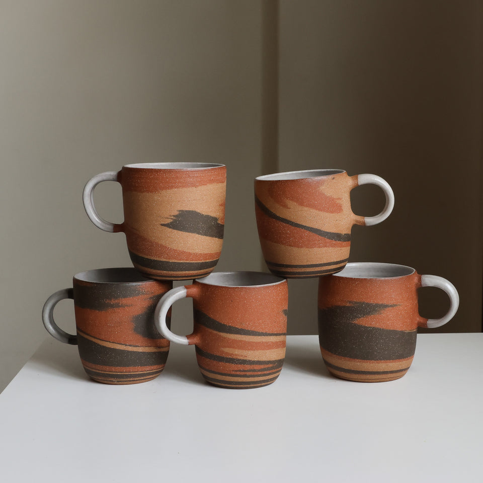 Three clay mug