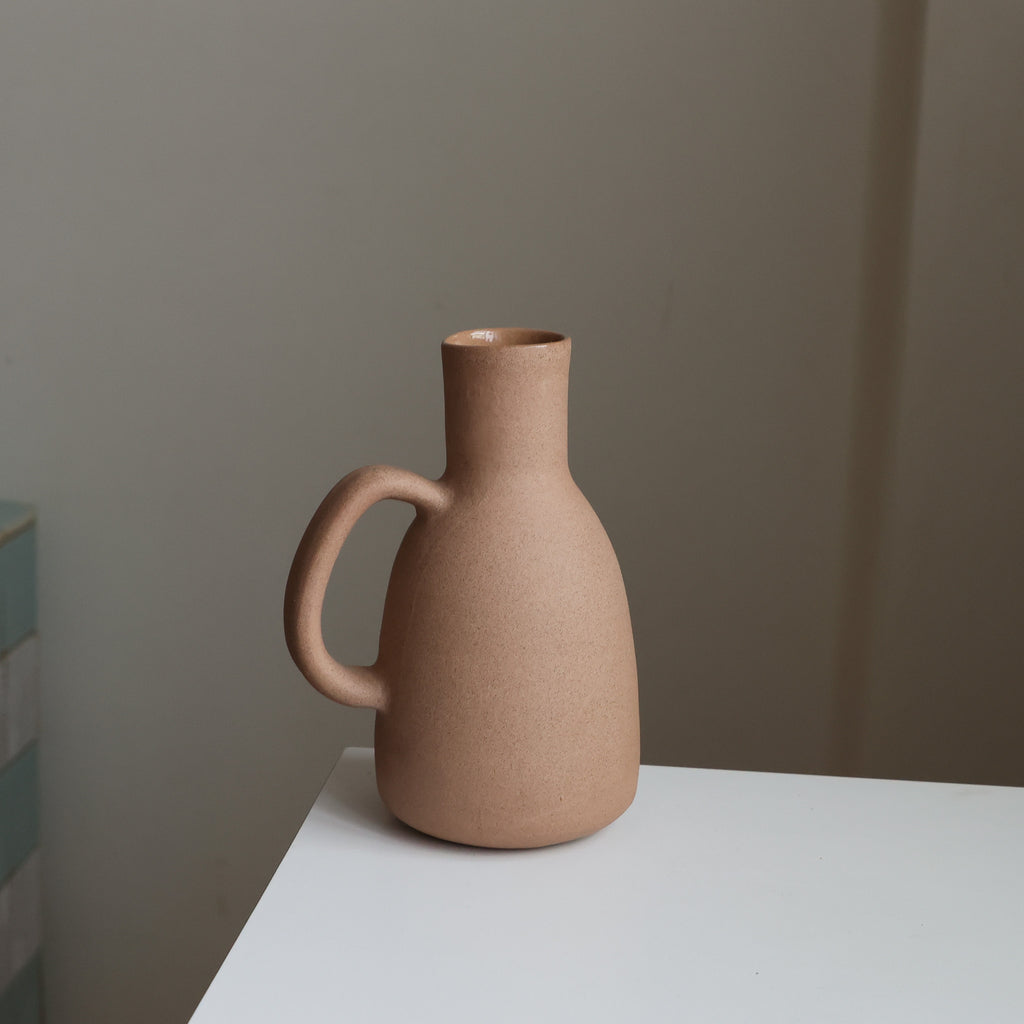 Tinted stoneware bottle