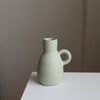 Tinted stoneware bottle