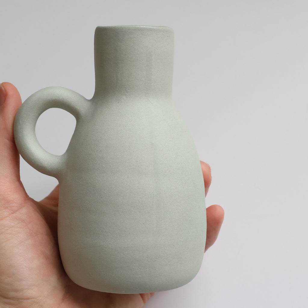 Tinted stoneware bottle