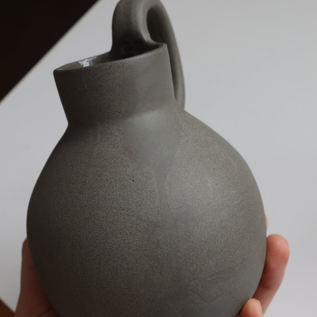 Tinted stoneware bottle