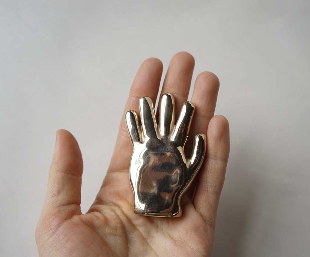 Gilded hand sculpture